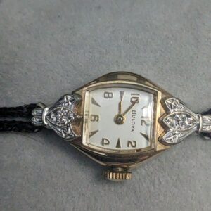 Women's two tone Gold and Diamond Bulova